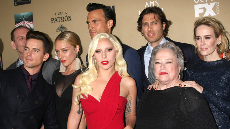Lady Gaga posing with the cast of American Horror Story: Hotel