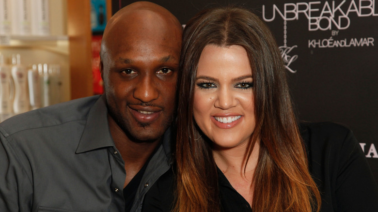 Lamar Odom and Khloe Kardashian smiling