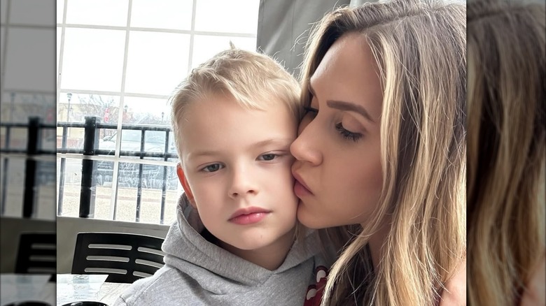 Lara Trump kissing her son Luke Trump