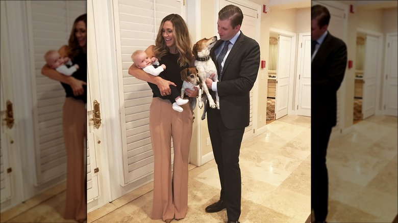 Lara Trump, Eric Trump holding son, dogs