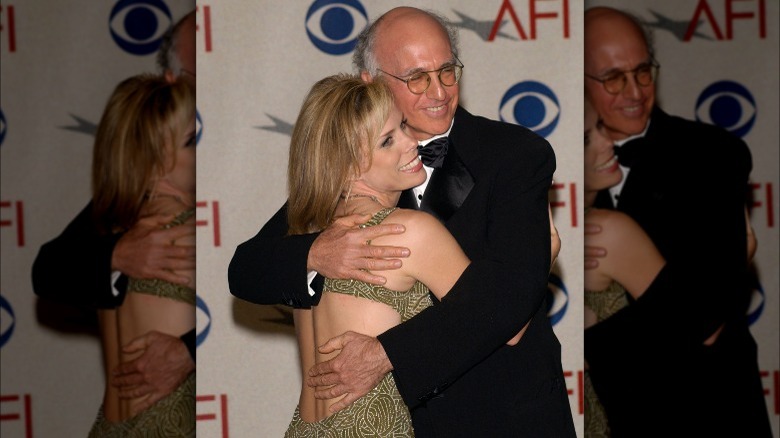 Cheryl Hines and Larry David hugging