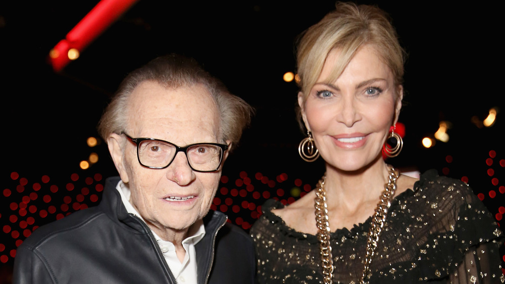 Larry King and wife Shawn King smiling