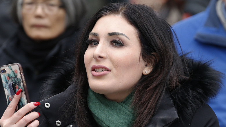 Laura Loomer green scarf