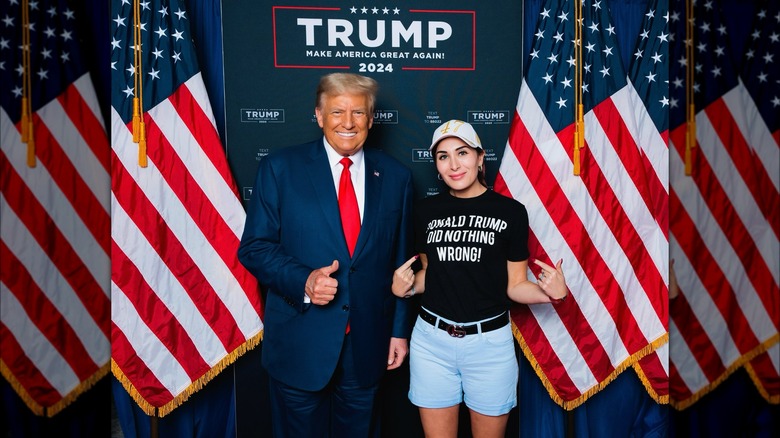 Donald Trump, Laura Loomer posing