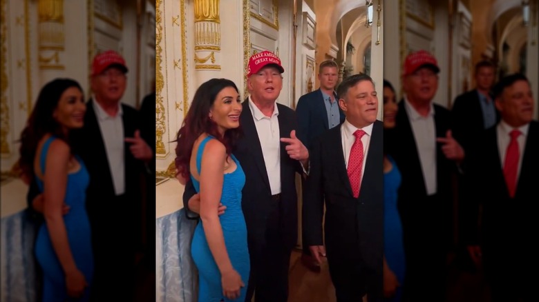 Donald Trump with arm around Laura Loomer