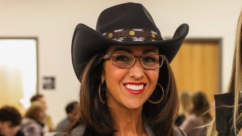 Lauren Boebert posing in a cowboy hat