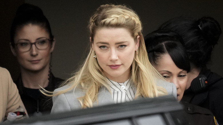 Amber Heard leaves court