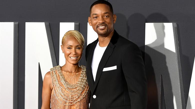 Jada Pinkett Smith and Will Smith posing