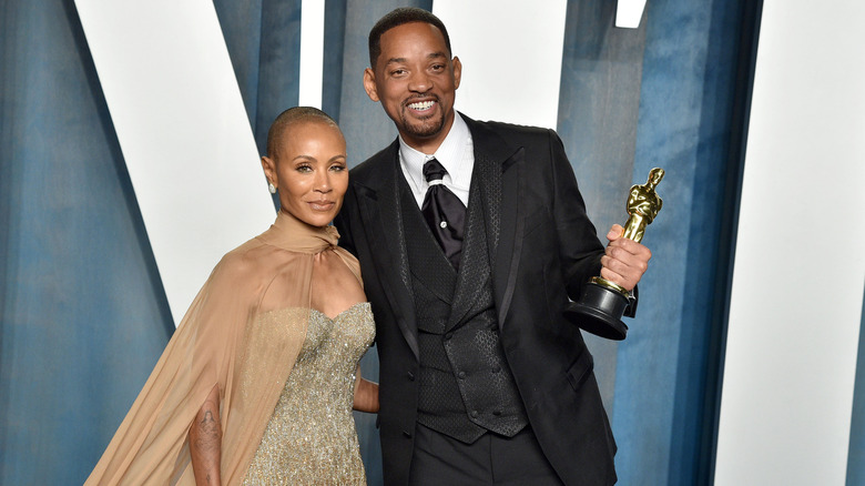 Jada and Will pose with trophy