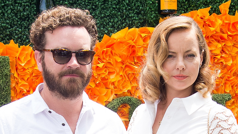 Danny Masterson and Bijou Phillips wearing white