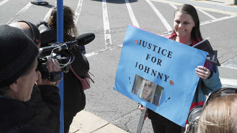 Spectators showing support for Johnny Depp