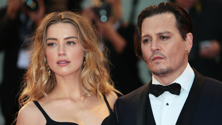 Amber Heard and Johnny Depp posing