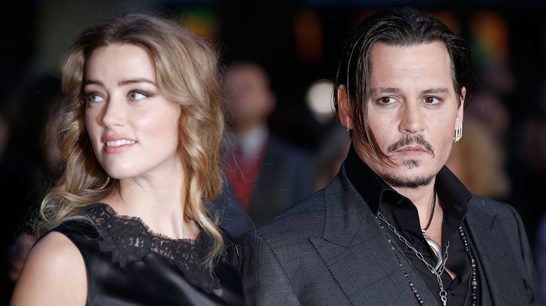 Amber Heard and Johnny Depp smiling