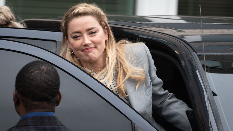 Amber Heard getting out of a car