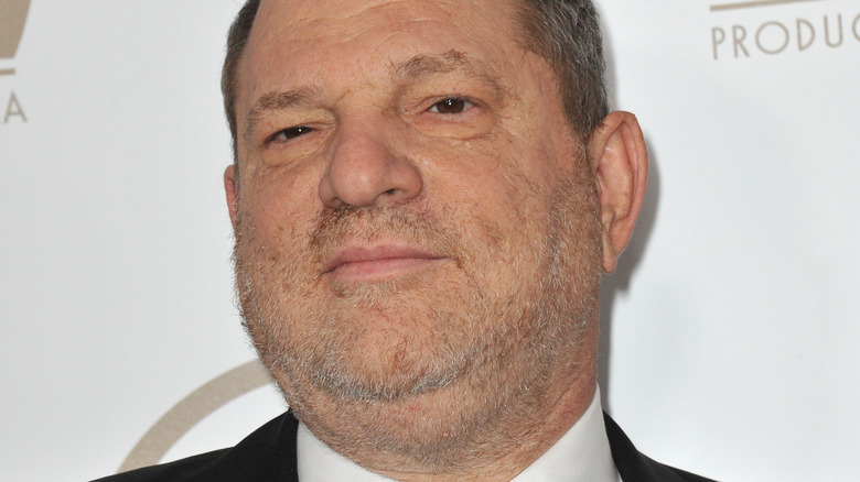 Weinstein smirking short stubble beard