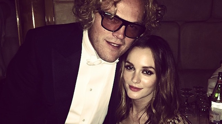 Leighton Meester and Peter Dundas posing