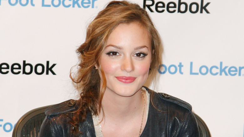 Leighton Meester smiling on red carpet