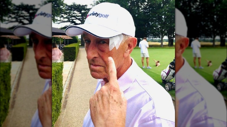 Len Goodman wearing a white cap