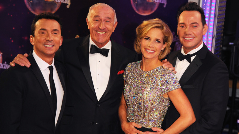 Len Goodman posing with other "Strictly Come Dancing" judges