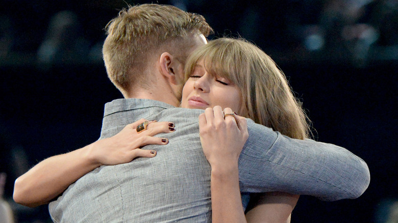 Taylor Swift hugs Calvin Harris in 2016