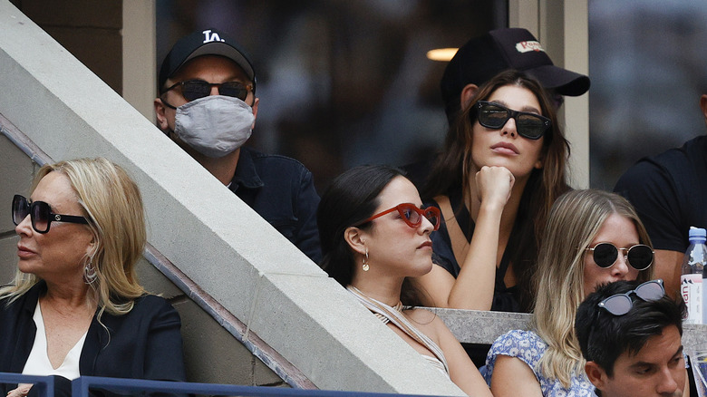 Leonardo DiCaprio and Camila Morrone spectating