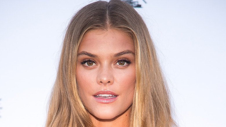 Nina Agdal poses with lips parted