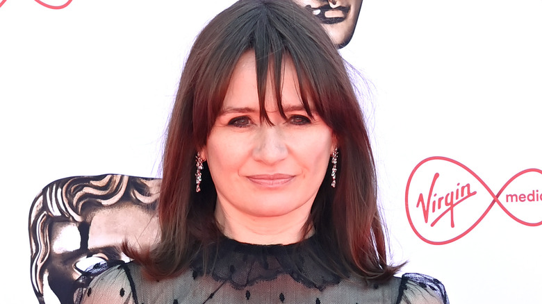 Emily Mortimer wearing black