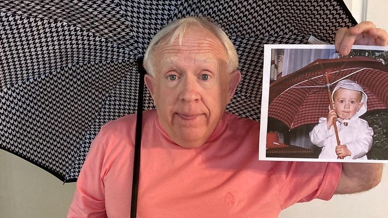 Leslie Jordan with a baby picture of himself