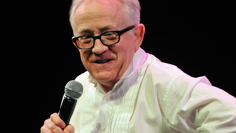 Leslie Jordan smiling into mic