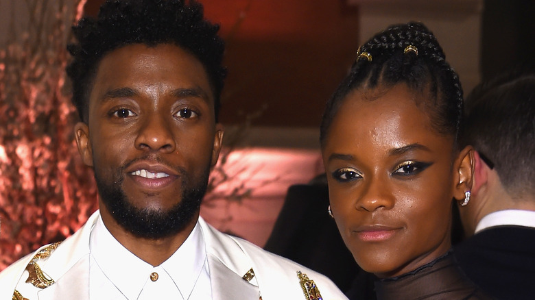 Chadwick Boseman and Letitia Wright smiling 