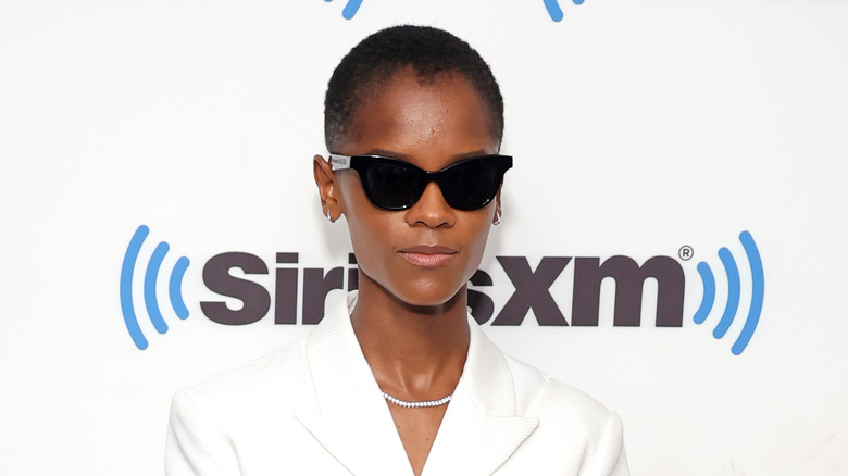 Letitia Wright in sunglasses on the red carpet