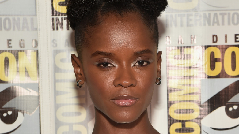 Letitia Wright looking pensive on the red carpet