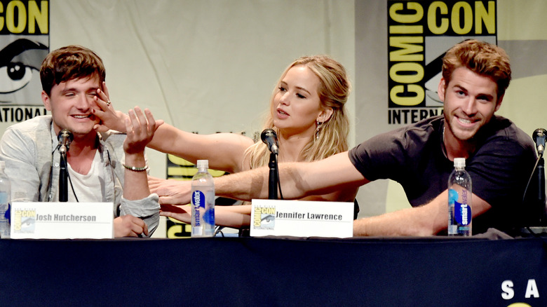 Liam Hemswoth goofing off with Josh Hutcherson and Jennifer Lawrence