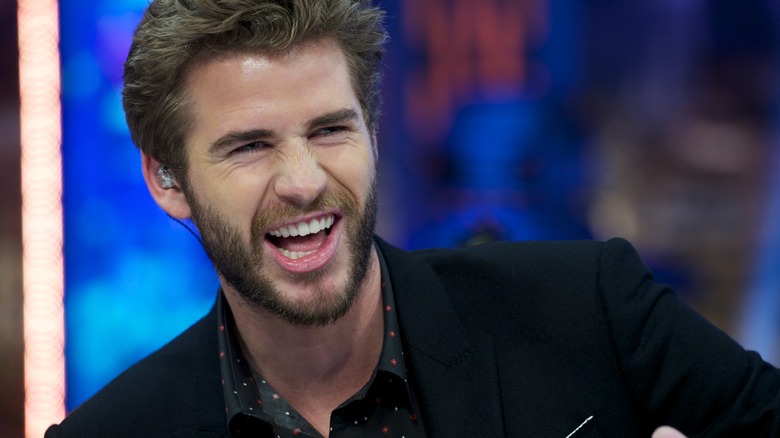 Liam Hemsworth laughing