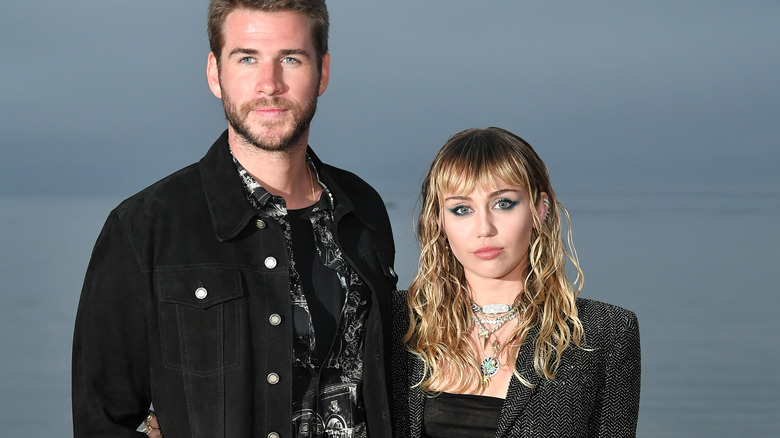 Liam Hemsworth poses with Miley Cyrus