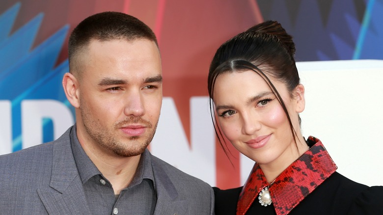 Liam Payne and Maya Henry posing