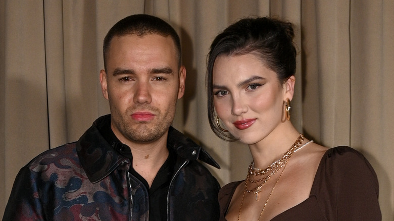 Liam Payne and Maya Henry posing