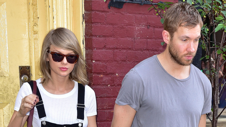 Taylor Swift and Calvin Harris walking