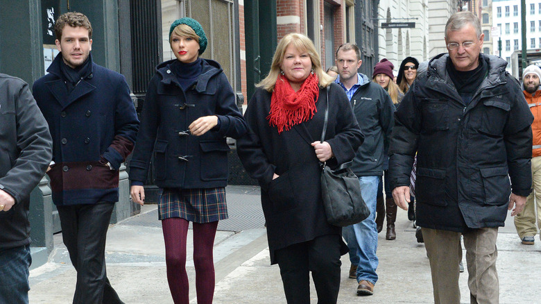 Austin, Taylor, Andrea, and Scott Swift walking