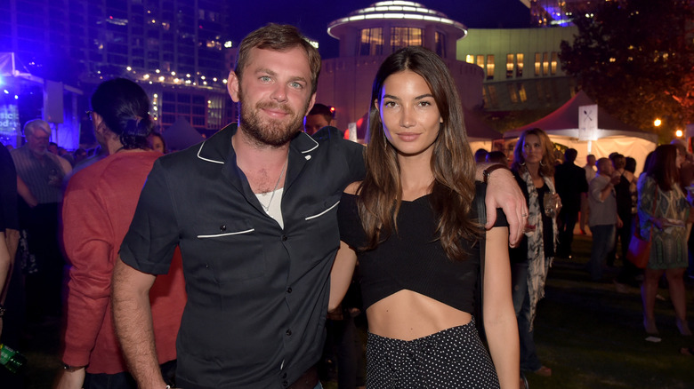 Lily Aldridge and Caleb Followill smile