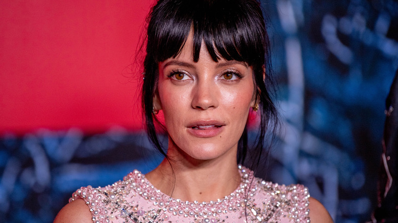 Lily Allen with black hair in updo