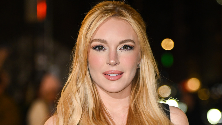 Lindsay Lohan on red carpet of Our Little Secret premiere