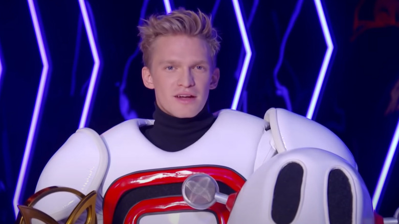 Cody Simpson wearing robot costume