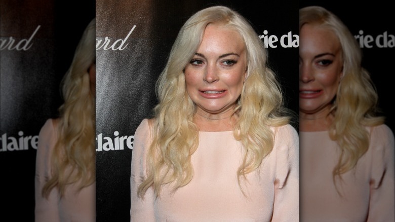 Lindsay Lohan grimacing awkwardly
