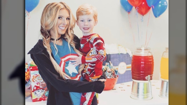 Lindsie Chrisley holds her son Jackson