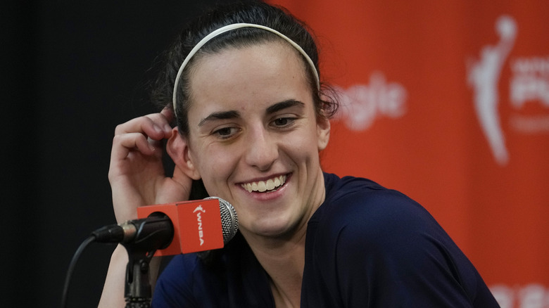 Caitlin Clark at a press conference