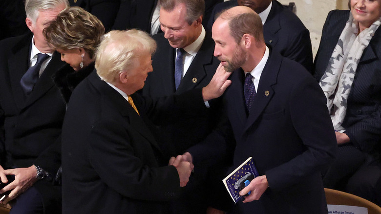 Donald Trump shaking hands with Prince William