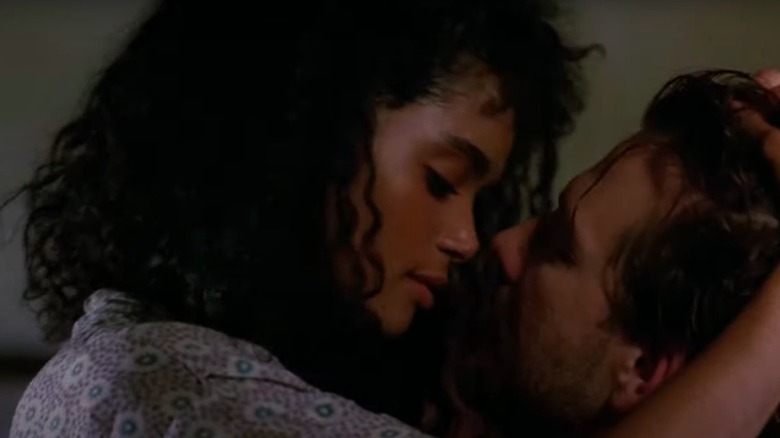 Lisa Bonet and Mickey Rourke embracing