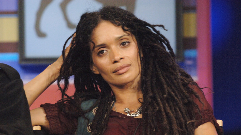 Lisa Bonet resting her head on her hand