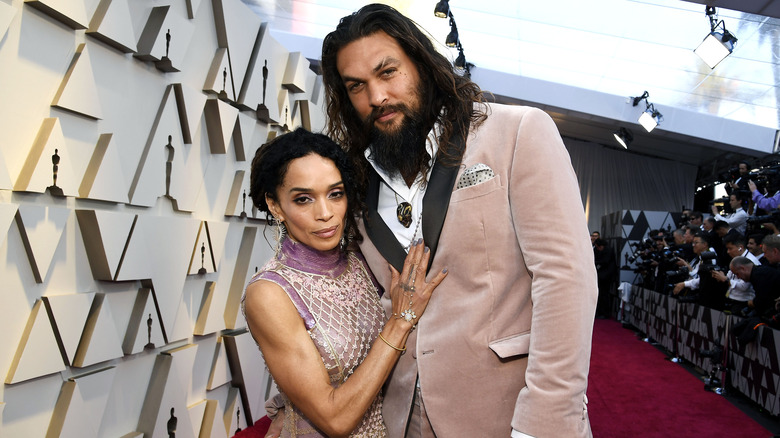 Lisa Bonet and Jason Momoa posing